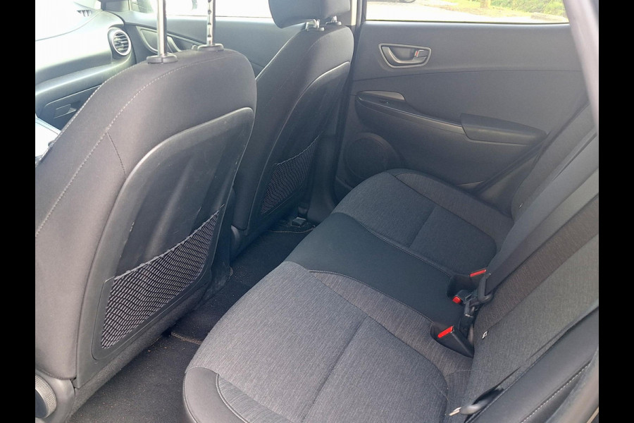 Hyundai Kona EV Fashion 64 kWh | SOH: nnb | 3 Fase | Warmtepomp | HUD | Navi | Adaptive CC | Blindspot |