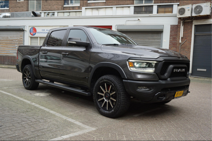 Dodge Ram 1500 5.7 V8 4x4 Rebel Sport | Luchtvering PANO -dak | Black Line | Off Road | Groot Navi | Apple CarPlay | Keyless | 20inch | Harman Kardon | Full LED | LPG onderbouw |3/2026 beurt + 4x Banden  | excl BTW