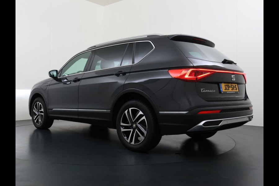 Seat Tarraco 1.4 TSI e-Hybrid PHEV Xperience Business Intense VAN €31.900,- NU VOOR SLECHTS €29.877,- Uw LENTEVOORDEEL €2.023,- |ELEK. ACHTERKLEP| DODE HOEK SENSOR| STOEL+ STUUR VERWARMING| 360 CAMERA | ACHTERBANK VERWARMD| CARPLAY| RIJKLAARPRIJS INCL. 12 MND BOVAG GARANTIE