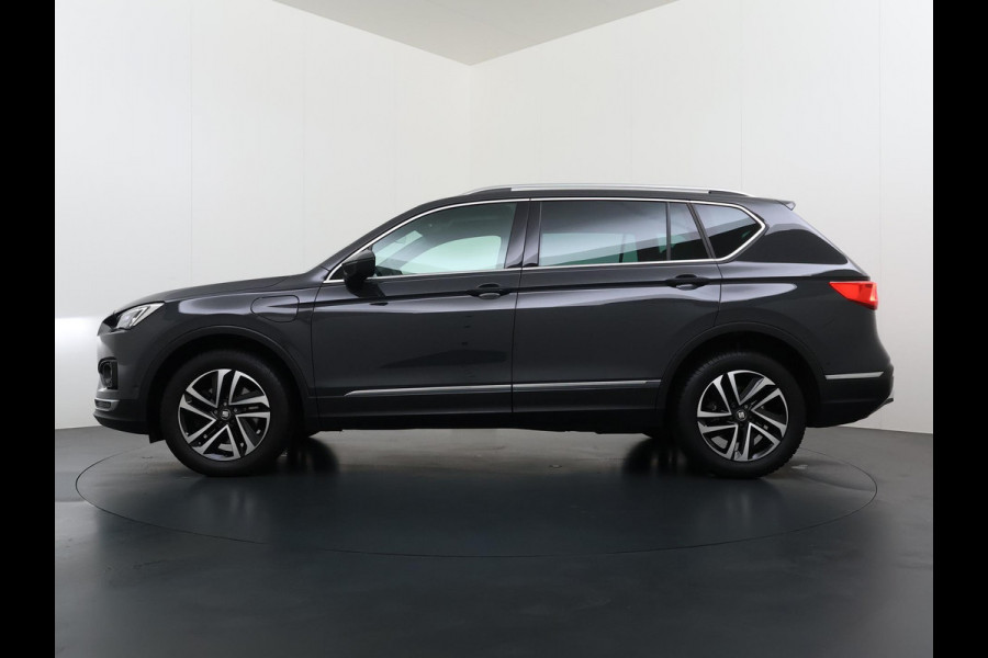 Seat Tarraco 1.4 TSI e-Hybrid PHEV Xperience Business Intense VAN €31.900,- NU VOOR SLECHTS €29.877,- Uw LENTEVOORDEEL €2.023,- |ELEK. ACHTERKLEP| DODE HOEK SENSOR| STOEL+ STUUR VERWARMING| 360 CAMERA | ACHTERBANK VERWARMD| CARPLAY| RIJKLAARPRIJS INCL. 12 MND BOVAG GARANTIE