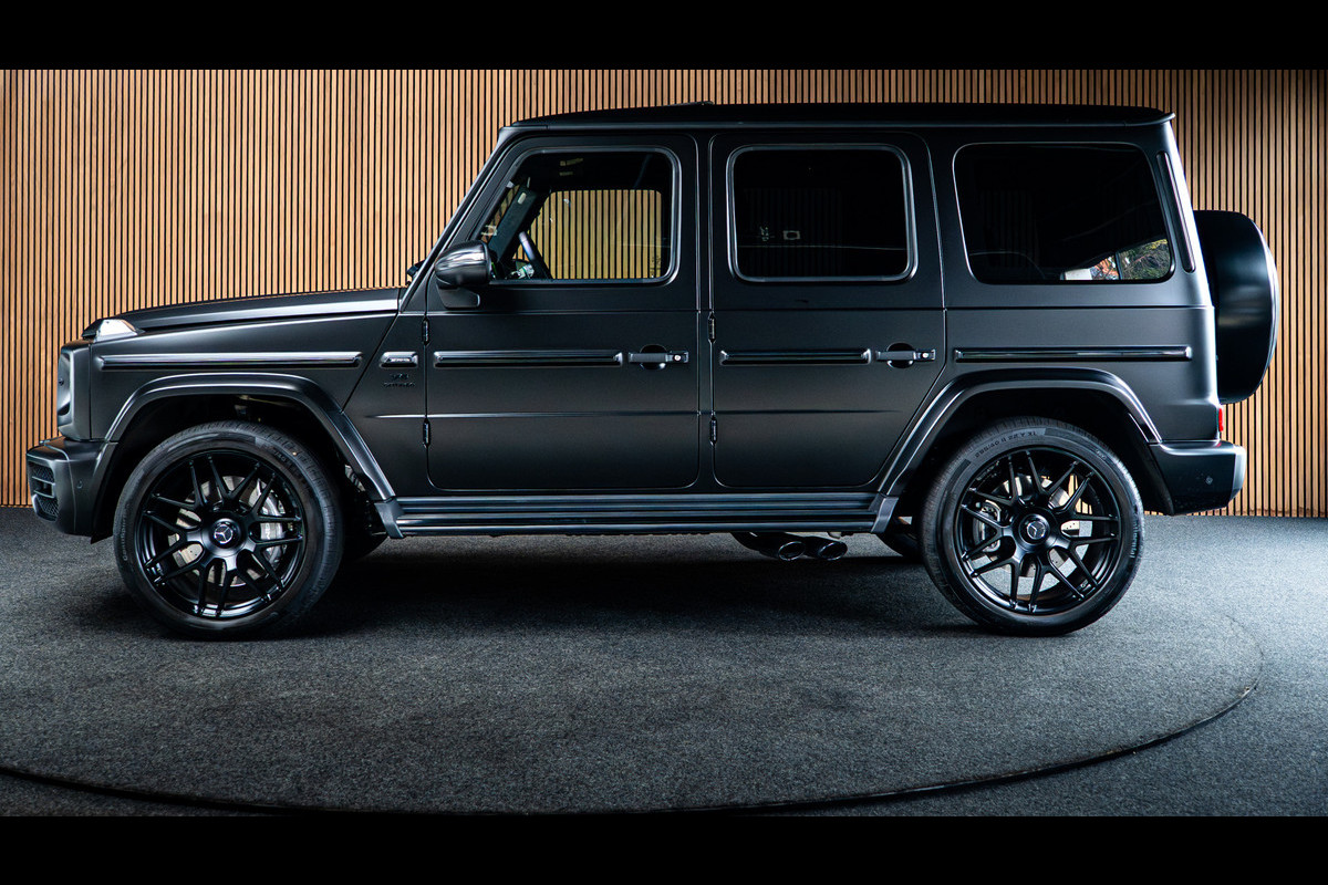 Mercedes-Benz G-Klasse 63 Navi Burmester Leer 360 Camera PTS Open dak Massage Distronic+ Memory seats Stoelventilatie Stoelverwarming Climate voor & achter Trekhaak