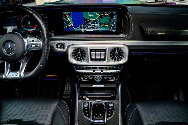 Mercedes-Benz G-Klasse 63 Navi Burmester Leer 360 Camera PTS Open dak Massage Distronic+ Memory seats Stoelventilatie Stoelverwarming Climate voor & achter Trekhaak