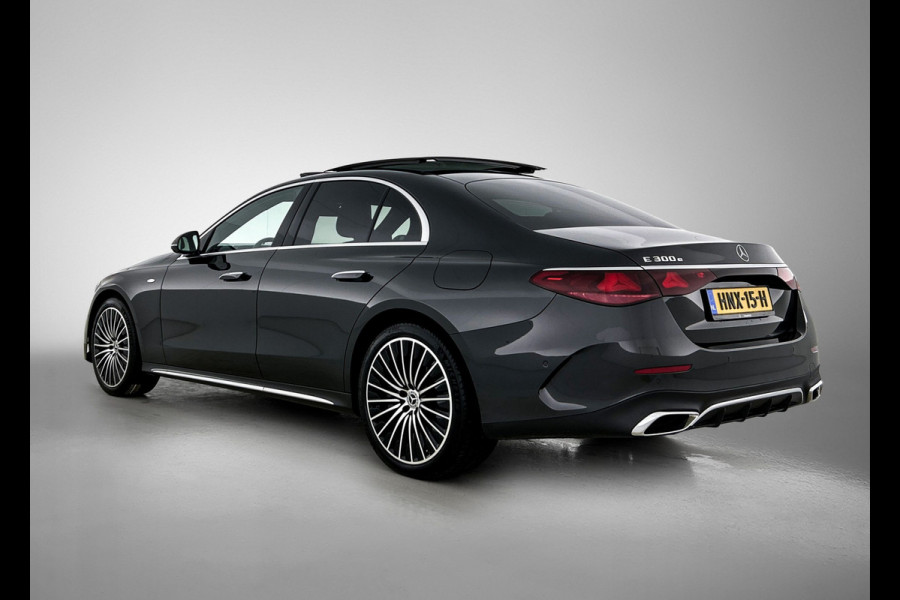 Mercedes-Benz E-Klasse 300 e Sport Edition AMG Line | Panorama Schuif-Kanteldak | Distronic | Lederen bekleding | Alarm | Parkeerpakket met 360°-camera | 20 Inch AMG Velgen. Inclusief 24 maanden MB Certified garantie voor Europa.
