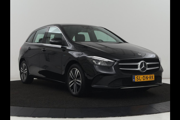 Mercedes-Benz B-Klasse 250e Urban | Leder | Stoelverwarming | Sfeerverlichting | Camera | Park Assist | Navigatie | Full LED | Widescreen | DAB | Cruise control | Bluetooth | Climate control | PHEV | Plug In