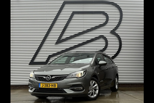 Opel Astra Sports Tourer 1.2 Business Edition 2e Eigenaar,Apple Carplay,Airco,Camera,Cruise,PDC,Trekhaak,N.A.P,APK tot 07-2026