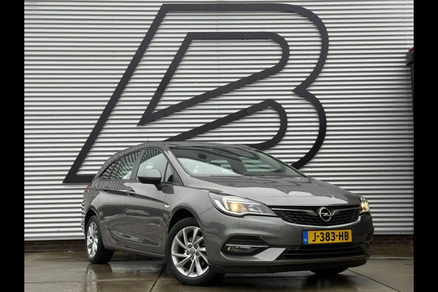 Opel Astra Sports Tourer 1.2 Business Edition 2e Eigenaar,Apple Carplay,Airco,Camera,Cruise,PDC,Trekhaak,N.A.P,APK tot 07-2026