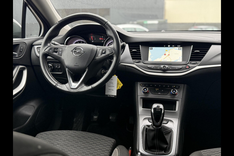 Opel Astra Sports Tourer 1.2 Business Edition 2e Eigenaar,Apple Carplay,Airco,Camera,Cruise,PDC,Trekhaak,N.A.P,APK tot 07-2026