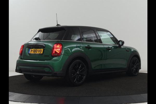 MINI Cooper 1.5 Business Edition | Harman/Kardon | Carplay | Verwarmde voorruit | Navigatie | Full LED | Half leder | Parkeerhulp | Climate control | Cruise control | Bluetooth | British Racing Green