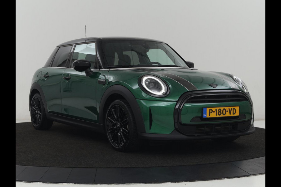 MINI Cooper 1.5 Business Edition | Harman/Kardon | Carplay | Verwarmde voorruit | Navigatie | Full LED | Half leder | Parkeerhulp | Climate control | Cruise control | Bluetooth | British Racing Green