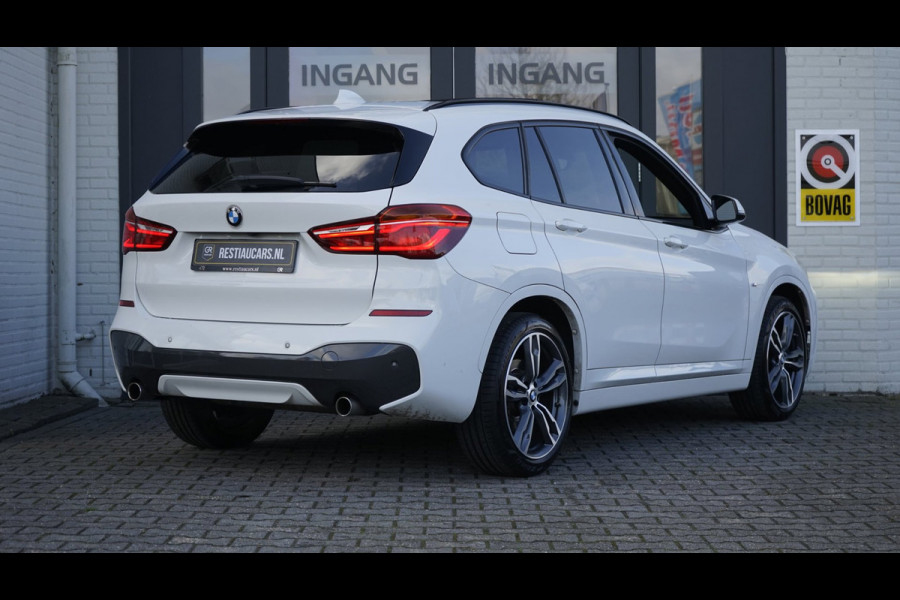BMW X1 SDrive20i M Sport Shadowline CAMERA-CLIMA-CRUISE-FULL LED-HEADUP-LEDER-NAVIGATIE-PANORAMA-STOELVERWARMING-TREKHAAK