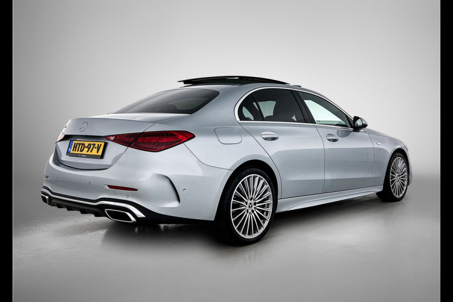 Mercedes-Benz C-Klasse 300 e Business Solution AMG AMG Line | Panorama Schuif-Kanteldak | Distronic | Lederen bekleding | Alarm | Parkeerpakket met 360°-camera | 20 Inch AMG Velgen. Inclusief 24 maanden Mercedes-Benz Certified garantie voor Europa.