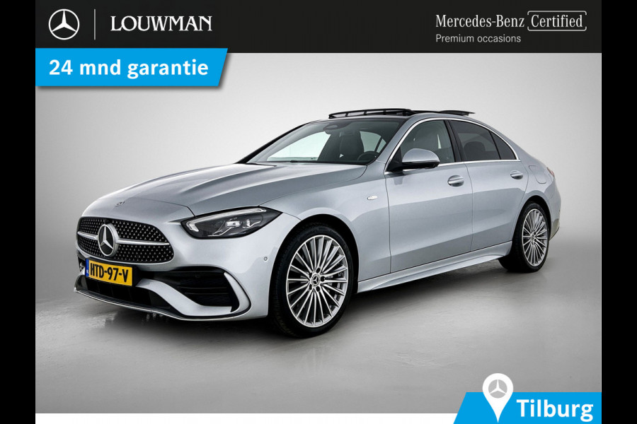 Mercedes-Benz C-Klasse 300 e Business Solution AMG AMG Line | Panorama Schuif-Kanteldak | Distronic | Lederen bekleding | Alarm | Parkeerpakket met 360°-camera | 20 Inch AMG Velgen. Inclusief 24 maanden Mercedes-Benz Certified garantie voor Europa.