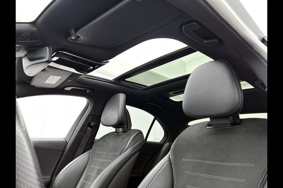 Mercedes-Benz C-Klasse 300 e Business Solution AMG AMG Line | Panorama Schuif-Kanteldak | Distronic | Lederen bekleding | Alarm | Parkeerpakket met 360°-camera | 20 Inch AMG Velgen. Inclusief 24 maanden Mercedes-Benz Certified garantie voor Europa.