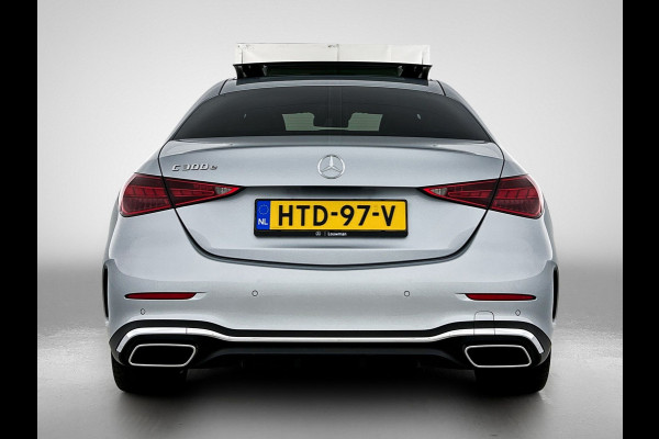 Mercedes-Benz C-Klasse 300 e Business Solution AMG AMG Line | Panorama Schuif-Kanteldak | Distronic | Lederen bekleding | Alarm | Parkeerpakket met 360°-camera | 20 Inch AMG Velgen. Inclusief 24 maanden Mercedes-Benz Certified garantie voor Europa.