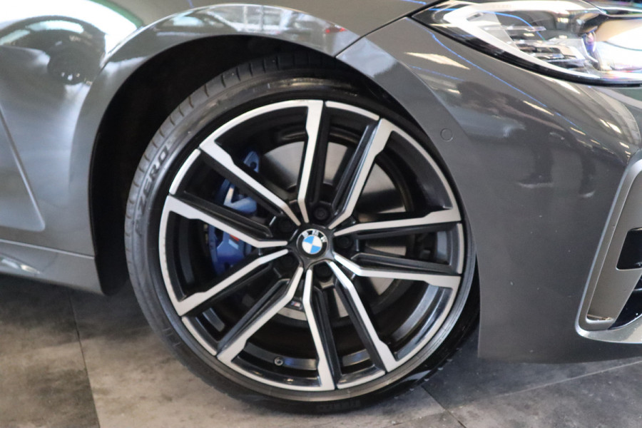 BMW 4 Serie Cabrio M440i xDrive High-Executive 374PK Individueel-lak Navigatie  Volleder 19LMV Head up