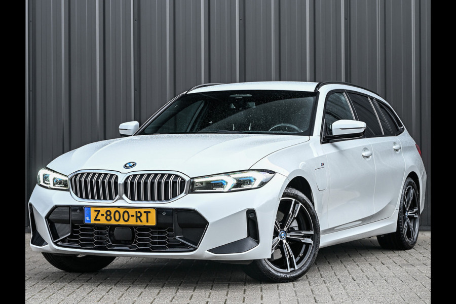 BMW 3 Serie Touring 330e xDrive M-Sport | Comfort access | Trekhaak | Adaptive led | Driving assistant prof. | Dab+ | Hifi sound | Head-up | Camera