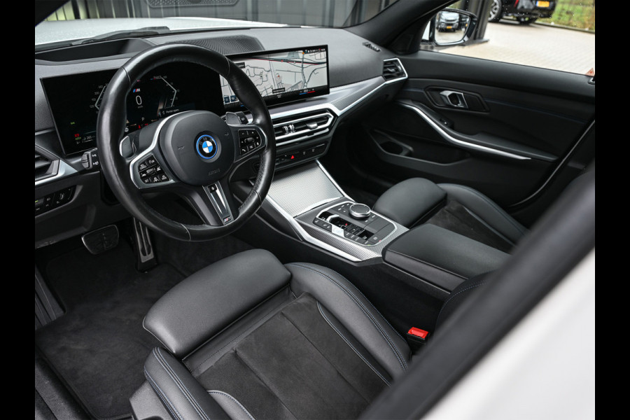 BMW 3 Serie Touring 330e xDrive M-Sport | Comfort access | Trekhaak | Adaptive led | Driving assistant prof. | Dab+ | Hifi sound | Head-up | Camera