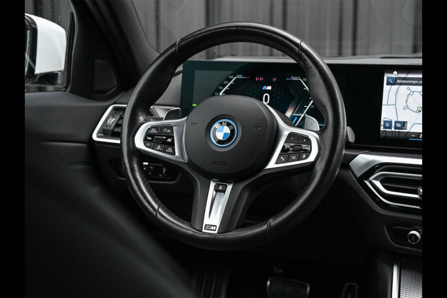 BMW 3 Serie Touring 330e xDrive M-Sport | Comfort access | Trekhaak | Adaptive led | Driving assistant prof. | Dab+ | Hifi sound | Head-up | Camera