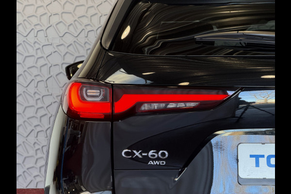 Mazda CX-60 2.5 e-SkyActiv PHEV HOMURA ELEK.STOEL PANO SCHUIFDAK STOEL/STUUR.VERW/VENTILATIE HEADUP AWD 4X4 4WD ✅ Top Auto's Wijchen. Al 30 Jaar verkoop van Mazda , Alle Modellen PHEV / HEV / BENZINE✅