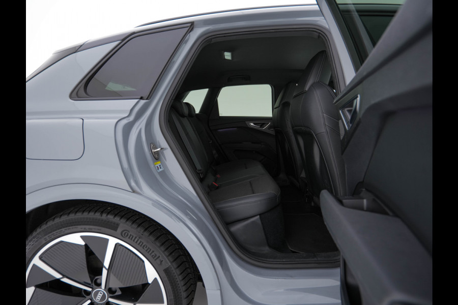 Audi Q4 e-tron 40 S-line Launch edition Competition 77 kWh [ 3-Fase-11kW ] {SOH-93%} (INCL-BTW) *HEATPUMP | LEATHER-FABRIC | SONOS-AUDIO | MATRIX-LED | ADAPTIVE-CRUISE | HEATED-SPORTSEATS | AMBIENTLIGHT | DIGI-COCKPIT | CAMERA | KEYLESS | DAB+ | NAVI-FULLMAP | TOWBAR | 21"ALU