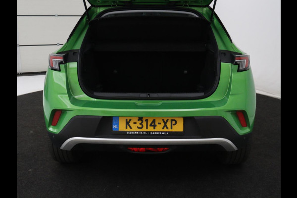 Opel Mokka-e Ultimate 50 kWh | SOH 90% | 3 Fase | Stoelverwarming | Leder/Alcantara | Warmtepomp | Adaptive cruise | Camera | Stuurverwarming | Carplay | Matrix LED | Navigatie | Park Assist