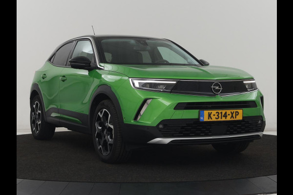 Opel Mokka-e Ultimate 50 kWh | SOH 90% | 3 Fase | Stoelverwarming | Leder/Alcantara | Warmtepomp | Adaptive cruise | Camera | Stuurverwarming | Carplay | Matrix LED | Navigatie | Park Assist