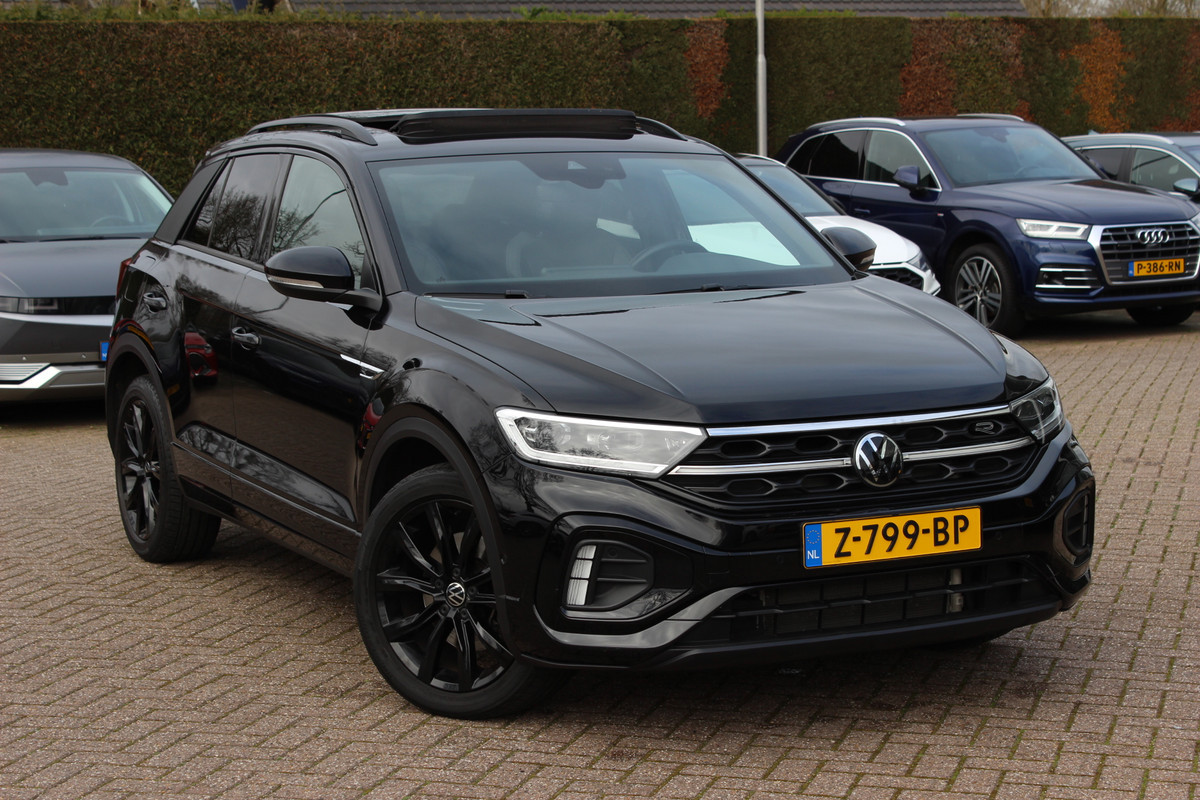 Volkswagen T-Roc 2.0 TSI 4Motion R-Line Business+ / 26.553 km! / Panoramadak / Camera / Leder / Matrix LED / 18'' / Sfeerverlichting / CarPlay / Stoelverwarming / DAB / ACC