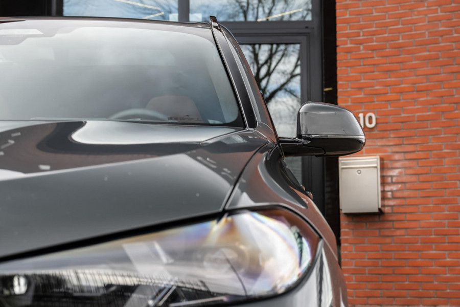 BMW X5 xDrive50e M-Sport Pro 490pk M-Seats 'Tartufo' Pano