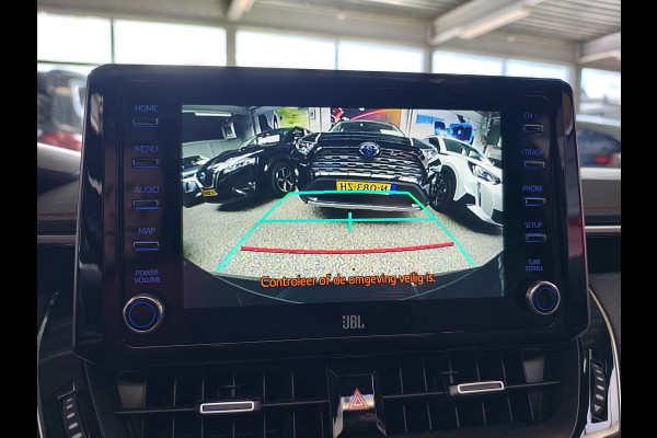 Toyota Corolla ''Gereserveerd'' 2.0I 184 PK Hybride AUT. Trekhaak Pano-Dak Camera Adaptive-Cruise Apple Carplay Android Stoel+Stuurverwarming Navi* Ecc JBL®-Aud Led Privacy Glas Lane Assist Regen-Lichtsensor Keyless Voorruit Verwarmbaar Dodehoekdetectie Zeer compleet!