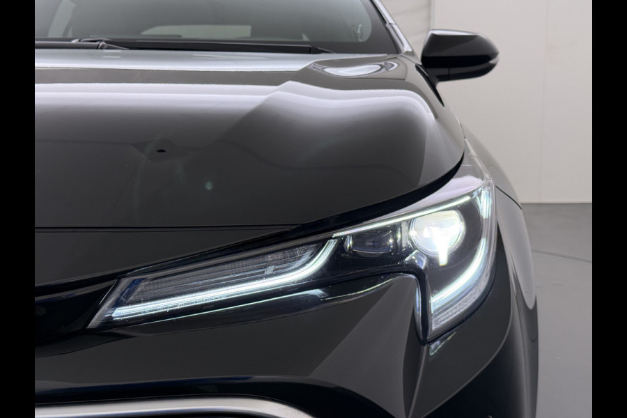 Toyota Corolla ''Gereserveerd'' 2.0I 184 PK Hybride AUT. Trekhaak Pano-Dak Camera Adaptive-Cruise Apple Carplay Android Stoel+Stuurverwarming Navi* Ecc JBL®-Aud Led Privacy Glas Lane Assist Regen-Lichtsensor Keyless Voorruit Verwarmbaar Dodehoekdetectie Zeer compleet!