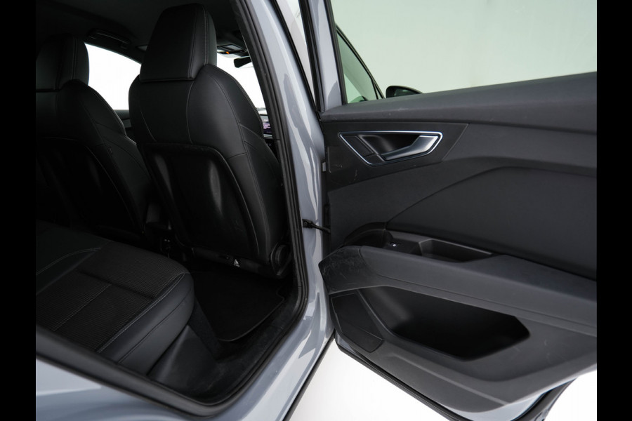 Audi Q4 e-tron 40 S-line Launch edition Competition 77 kWh [ 3-Fase-11kW ] {SOH-93%} (INCL-BTW) *HEATPUMP | LEATHER-FABRIC | SONOS-AUDIO | MATRIX-LED | ADAPTIVE-CRUISE | HEATED-SPORTSEATS | AMBIENTLIGHT | DIGI-COCKPIT | CAMERA | KEYLESS | DAB+ | NAVI-FULLMAP | TOWBAR | 21"ALU