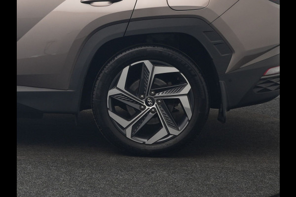 Hyundai Tucson 1.6 T-GDI Premium 4WD PHEV 265pk Dealer O.H. | Trekhaak Afn. | Adaptive Cruise | 360 Camera | Krell Premium Sound | Lederen Sportstoelen Memory & Ventilatie | Keyless | Apple Carplay | Stoelen & Stuur Verwarmd | Navigatie | DAB | Plug In Hybrid