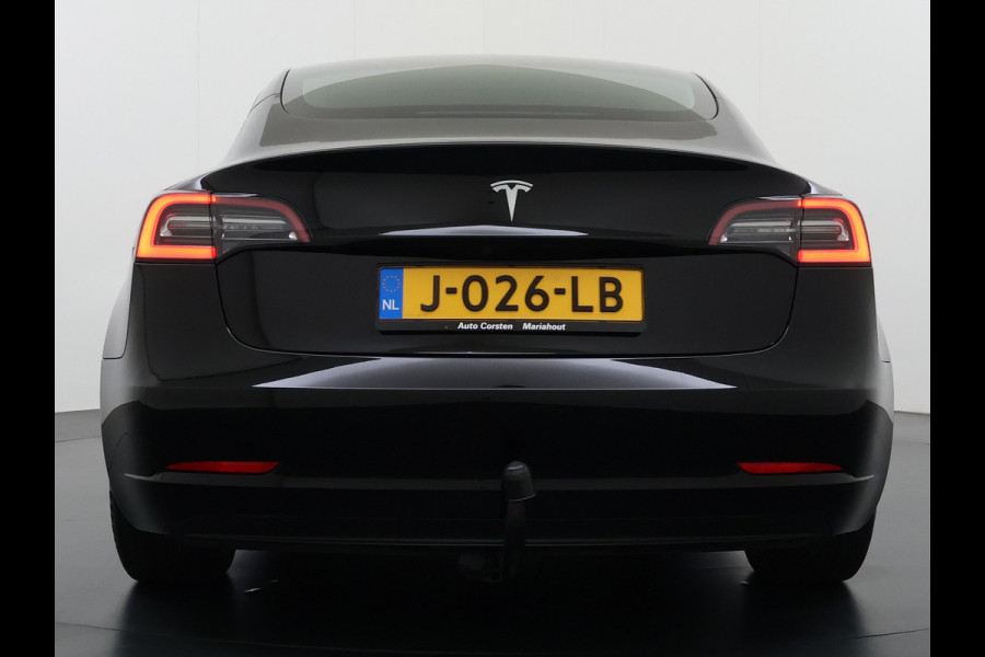 Tesla Model 3 SR+ 325PK Trekhaak Lmv 19" AutoPilot Leer Pano-Dak Adaptive Cruise Camera's Elektr.-Stuur+Stoelen+Spiegels+Geheugen+Easy-Entry+V SOH 84% Ecc Navi Led DAB Voorverwarmen interieur via App Keyless One-Pedal-Drive 1e Eigenaar Origineel Nederlandse Auto 1.584kg licht!