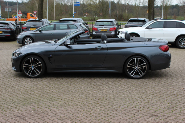 BMW 4 Serie Cabrio 420i High Executive Ed. M Sport / Camera / Leder / Harman Kardon / Nekverwarming / 19'' / Navigatie / Windscherm / DAB / Stoelverwarming / Cruise Control