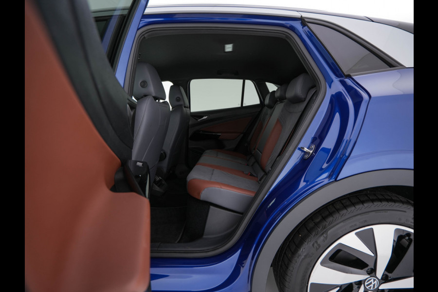 Volkswagen ID.4 First 77 kWh [ 3-Fase-11kW ] {SOH-83%} (INCL-BTW) *LEATHER-MICROFIBRE | FULL-LED | CRUISE | HEATED-COMFORTSEATS | DIGI-COCKPIT | AMBIENTLIGHT | NAVI-FULLMAP | PDC | TOWBAR | PRIVACY-GLASS | CAMERA | 20''ALU*