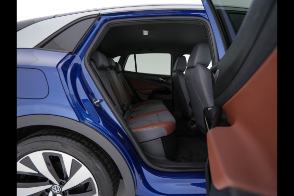 Volkswagen ID.4 First 77 kWh [ 3-Fase-11kW ] {SOH-83%} (INCL-BTW) *LEATHER-MICROFIBRE | FULL-LED | CRUISE | HEATED-COMFORTSEATS | DIGI-COCKPIT | AMBIENTLIGHT | NAVI-FULLMAP | PDC | TOWBAR | PRIVACY-GLASS | CAMERA | 20''ALU*
