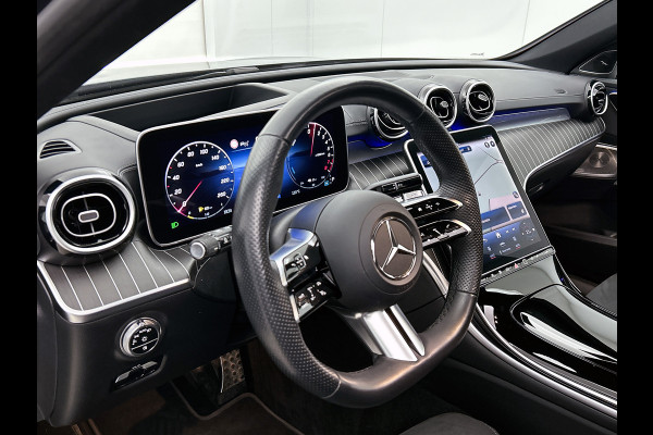 Mercedes-Benz C-Klasse Estate 300 e AMG Plug-In Hybride AMG Line | Night Pakket | Panorama Schuif-Kanteldak | Trekaak | Parkeerpakket met 360°-camera. Inclusief 24 maanden MB Certified garantie voor Europa.