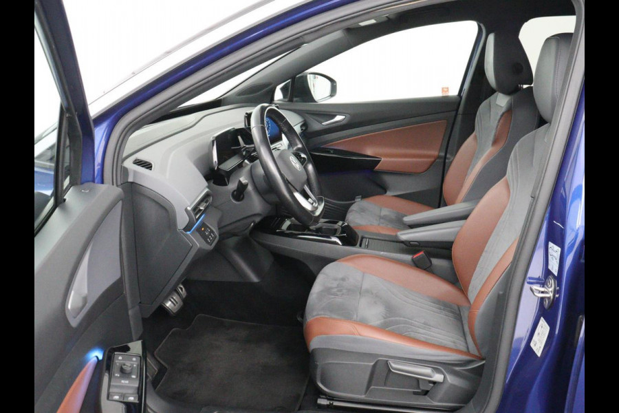Volkswagen ID.4 First 77 kWh | SOH 90% | Stoelverwarming | Adaptive cruise | 20'' | Half leder | Carplay | Navigatie | Sfeerverlichting | Full LED | Camera | Stuurverwarming