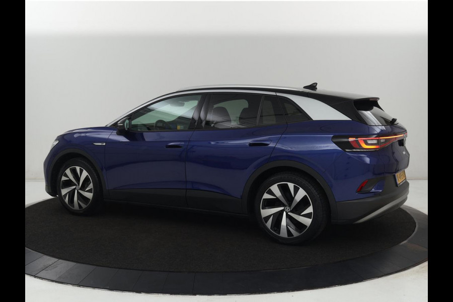 Volkswagen ID.4 First 77 kWh | SOH 90% | Stoelverwarming | Adaptive cruise | 20'' | Half leder | Carplay | Navigatie | Sfeerverlichting | Full LED | Camera | Stuurverwarming