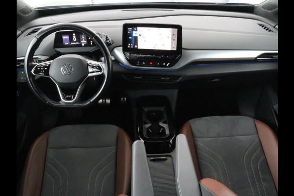 Volkswagen ID.4 First 77 kWh | SOH 90% | Stoelverwarming | Adaptive cruise | 20'' | Half leder | Carplay | Navigatie | Sfeerverlichting | Full LED | Camera | Stuurverwarming