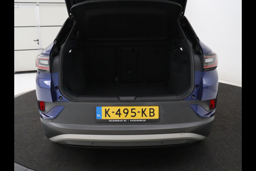 Volkswagen ID.4 First 77 kWh | SOH 90% | Stoelverwarming | Adaptive cruise | 20'' | Half leder | Carplay | Navigatie | Sfeerverlichting | Full LED | Camera | Stuurverwarming
