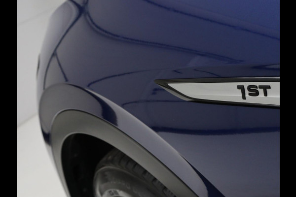 Volkswagen ID.4 First 77 kWh | SOH 90% | Stoelverwarming | Adaptive cruise | 20'' | Half leder | Carplay | Navigatie | Sfeerverlichting | Full LED | Camera | Stuurverwarming