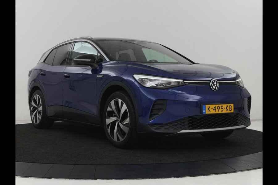 Volkswagen ID.4 First 77 kWh | SOH 90% | Stoelverwarming | Adaptive cruise | 20'' | Half leder | Carplay | Navigatie | Sfeerverlichting | Full LED | Camera | Stuurverwarming