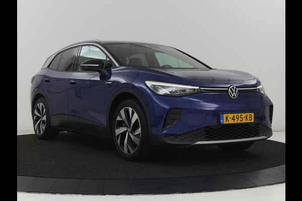 Volkswagen ID.4 First 77 kWh | SOH 90% | Stoelverwarming | Adaptive cruise | 20'' | Half leder | Carplay | Navigatie | Sfeerverlichting | Full LED | Camera | Stuurverwarming