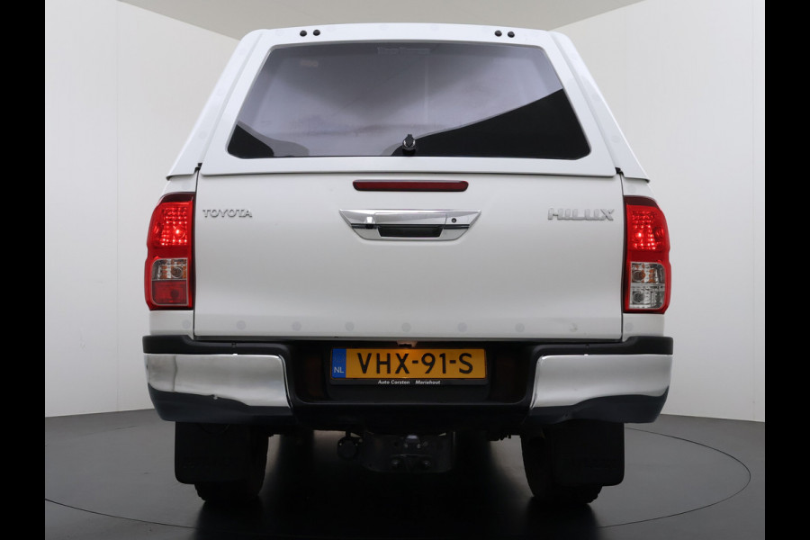 Toyota Hilux 2.4 D-4D 4WD AUT-6 Double Cab Professional Lier Canopy Hardtop (Huif) Trekhaak Navi* via Apple Carplay Android Auto Ecc Camera A Lane Assist Inbouw Kasten Bluetooth AWD EURO6 400Nm *3.500kg Trekvermogen* 1e Eigenaar Dealeronderhouden Origineel Nederlandse Auto