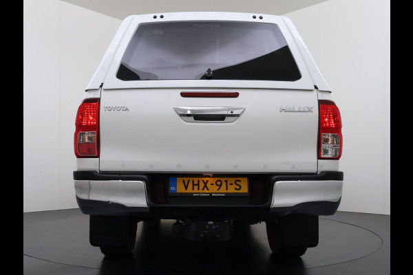 Toyota Hilux 2.4 D-4D 4WD AUT-6 Double Cab Professional Lier Canopy Hardtop (Huif) Trekhaak Navi* via Apple Carplay Android Auto Ecc Camera A Lane Assist Inbouw Kasten Bluetooth AWD EURO6 400Nm *3.500kg Trekvermogen* 1e Eigenaar Dealeronderhouden Origineel Nederlandse Auto