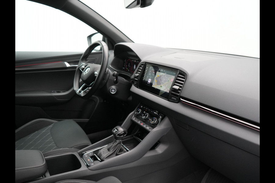 Škoda Karoq 1.5 TSI ACT Sportline Business DSG 150pk | Adaptive Cruise | Camera | Matrix LED | RS Sportstoelen Verwarmd | 18"L.M | Adaptive Onderstel | Keyless | Sfeerverlichting | Apple Carplay | Virtual | Navigatie | DAB |