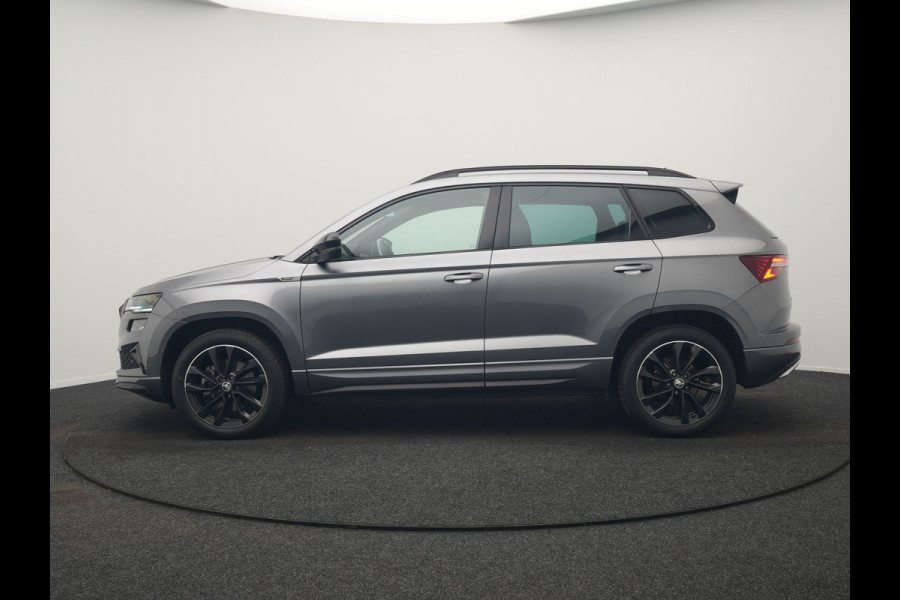 Škoda Karoq 1.5 TSI ACT Sportline Business DSG 150pk | Adaptive Cruise | Camera | Matrix LED | RS Sportstoelen Verwarmd | 18"L.M | Adaptive Onderstel | Keyless | Sfeerverlichting | Apple Carplay | Virtual | Navigatie | DAB |