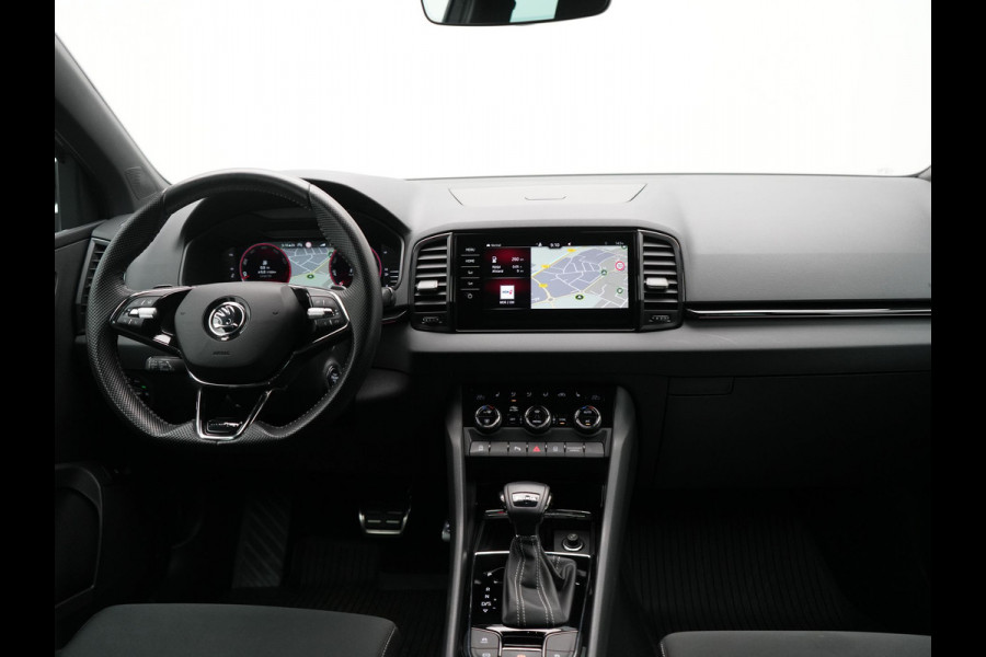 Škoda Karoq 1.5 TSI ACT Sportline Business DSG 150pk | Adaptive Cruise | Camera | Matrix LED | RS Sportstoelen Verwarmd | 18"L.M | Adaptive Onderstel | Keyless | Sfeerverlichting | Apple Carplay | Virtual | Navigatie | DAB |