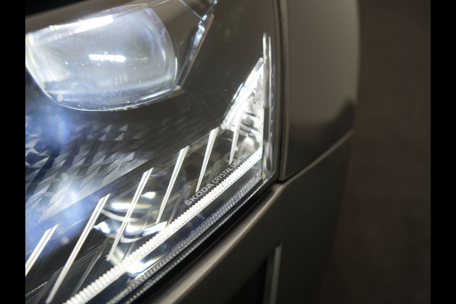 Škoda Karoq 1.5 TSI ACT Sportline Business DSG 150pk | Adaptive Cruise | Camera | Matrix LED | RS Sportstoelen Verwarmd | 18"L.M | Adaptive Onderstel | Keyless | Sfeerverlichting | Apple Carplay | Virtual | Navigatie | DAB |